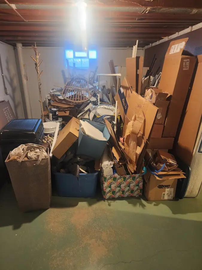 Roll-off dumpster container at job site for 15 Yard Dumpster Rental in Owings Mills